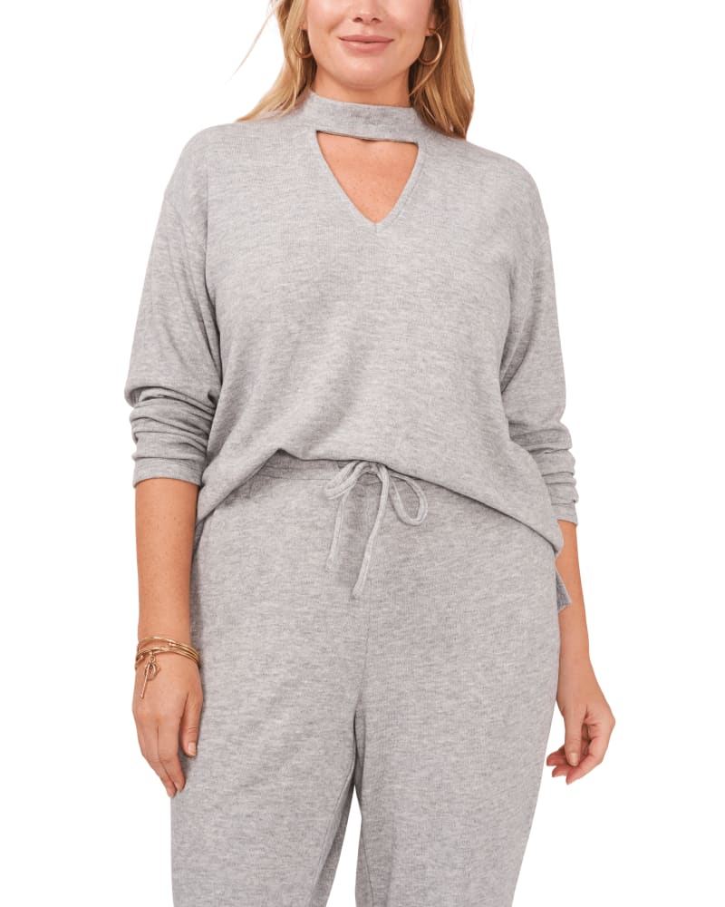 Front of a model wearing a size 0X Barb Keyhole Cutout Sweater in SILVER HEATHER by 1.State. | dia_product_style_image_id:262003